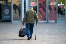 elderly-man-cane-walking-down-street-rear-view-concept-disability-old-age-limping-elderly-man-...jpg